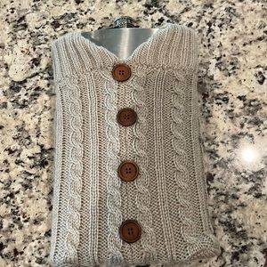 Flask with sweater. Holds 64 ounces